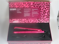 Hair straightener 230 degrees pink cheetah model   free serum 100ml